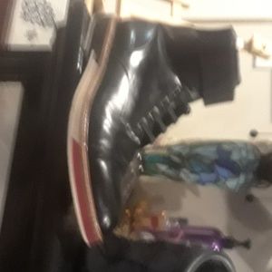 A pair of 1700 dollar Louis Vuitton designer boots